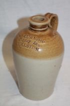 A small 19th century stoneware flagon impressed for W.