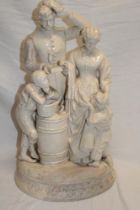 A large 19th century cream glazed figure of an American Civil War soldier with wife and children on
