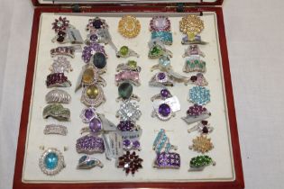 A jewellery tray containing a selection of over 45 various silver dress rings set various