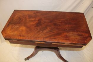 A 19th century figured mahogany and cross-banded rectangular turn-over top card table with baize