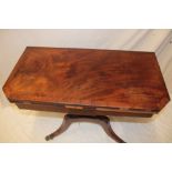 A 19th century figured mahogany and cross-banded rectangular turn-over top card table with baize