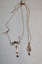 A 9ct gold Art Nouveau-style pendant necklace set garnet and pearls and one other similar pendant