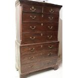 A George III mahogany chest-on-chest, the base with three long graduated drawers,