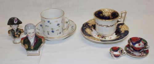 Two 19th century tea cups and saucers with floral decoration,