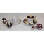 Two 19th century tea cups and saucers with floral decoration,