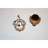 A 9ct gold pendant set amethyst and seed pearls and a 9ct gold mounted swivel fob (2)