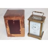 A French carriage clock with rectangular enamelled dial in brass traditional glazed case and