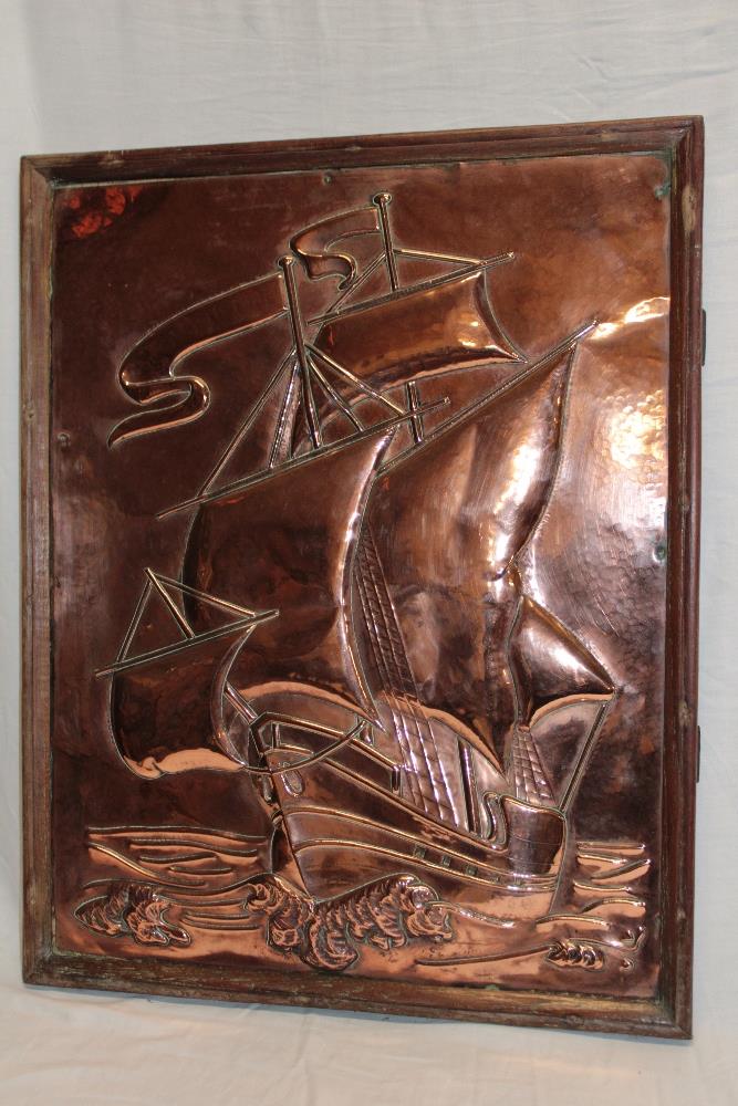 A Cornish copper rectangular plaque decorated in relief with a sailing galleon,