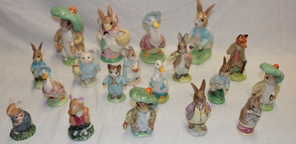 A selection of china Beatrix Potter figures including two large Beswick figures "Jemima