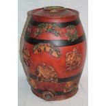 A 19th century painted stoneware gin barrel decorated in relief with coats of arms,
