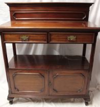 A Victorian walnut two-tier buffet with two drawers in the frieze and cupboard enclosed by two