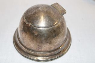 An Edward VII silver domed inkwell with hinged lid and weighted base,