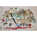 A quantity of various costume jewellery including necklaces, brooches, wristwatches,