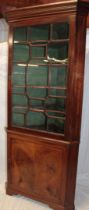 A 19th century mahogany corner display cabinet/bookcase with shelves enclosed by a single astragal