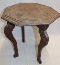 An unusual Eastern teak octagonal occasional table,