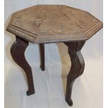 An unusual Eastern teak octagonal occasional table,