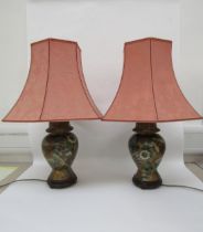 A pair of decorative lustre ceramic table lamps with butterfly detail, 64cm tall with shades