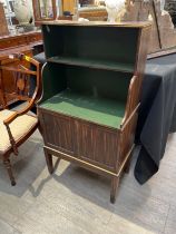 An early 20th Century waterfall bookcase with cupboard base, square tapering legs, handpainted