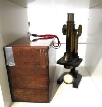 W. Watson & Sons Ltd., London 23400 "Praxis" microscope and C. Reichert microscope (2)