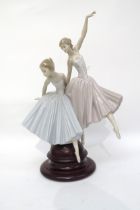 A Lladro figurine 'Merry Ballet' on wooden base. 47cm tall. No 5035
