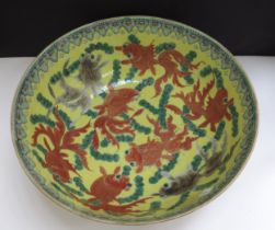 A 19th Century Chinese bowl decorated with goldfish in vibrant colours, 25cm diameter (chipped)