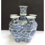 A Chinese blue and white porcelain tulip vase, scrolled foliate design, restored to central section,