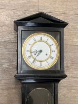 A late 19th Century Vienna Regulator wall hanging drop dial clock with two train movement striking