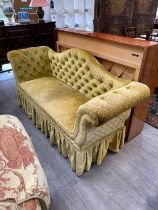 An early 20th Century gold velour sofa with button back, 90cm x 185cm x 60cm