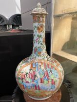 A late 19th / early 20th Century Chinese Famille Rose pattern bottle vase, restored a/f, 38cm high