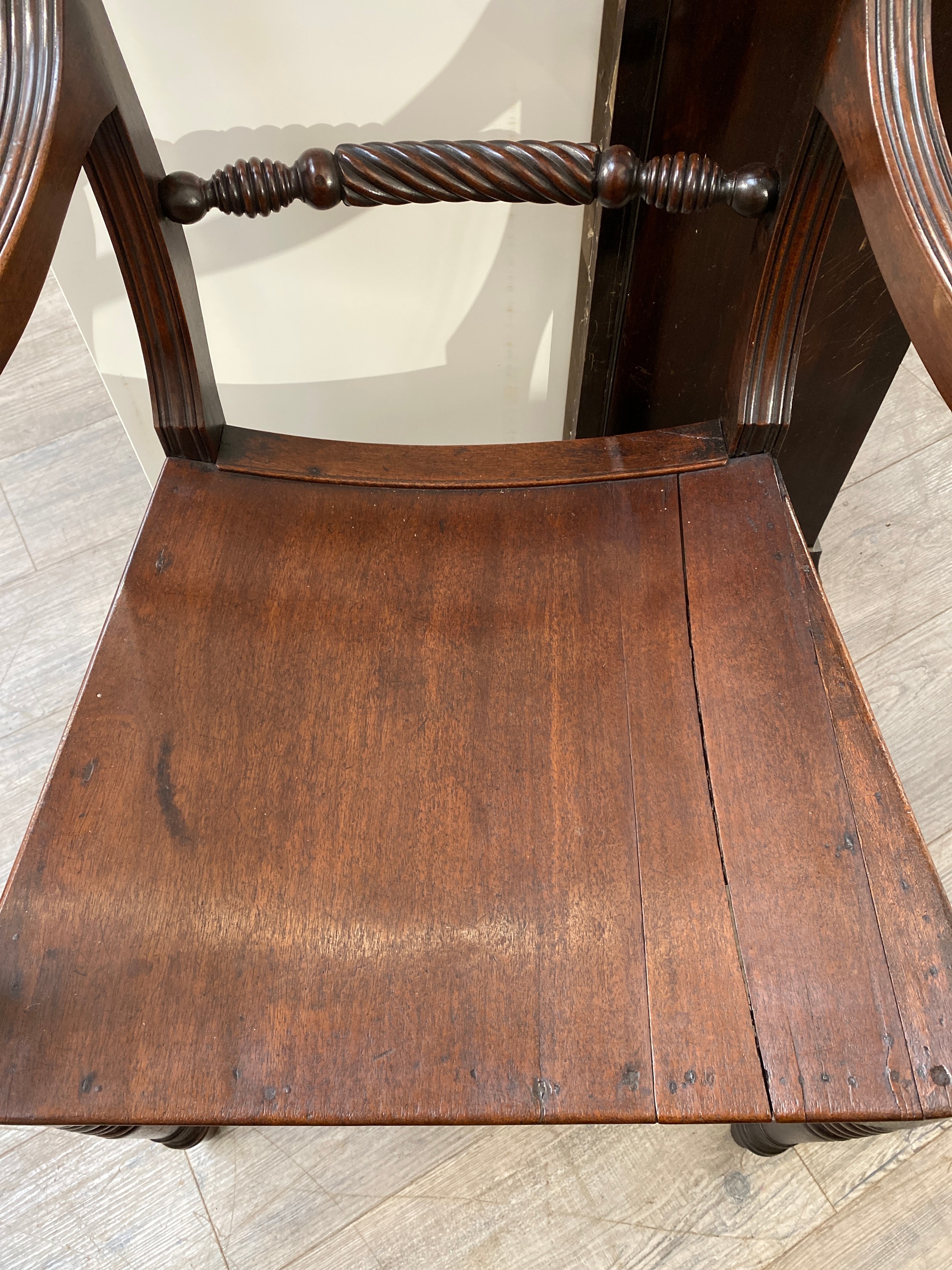 Circa 1830 an East Anglian mahogany and fruitwood armchair with carved rope twist ring turned back - Image 2 of 3