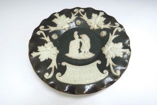 A Doulton Lambeth C1890 Rare stoneware shop advertising plate for "The International Fur Store,