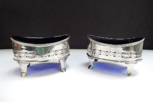 A pair of John Emes silver salts, pierced and etched decoration, London 1799, one blue glass liner