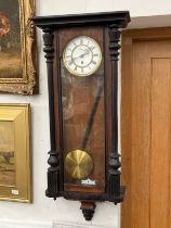 A late 19th Century regulator wall clock with hour, minute and seconds, 100cm tall x 42.5cm wide