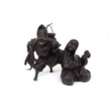 A 20th Century bronze figural group, 'Heading to Market'. 23cm x 31cm