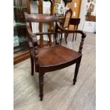 Circa 1830 an East Anglian mahogany and fruitwood armchair with carved rope twist ring turned back