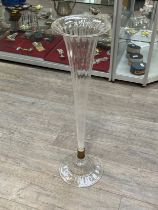 A pair of late Victorian clear fluted glass vases, 80cms tall, bases 24cm diameter
