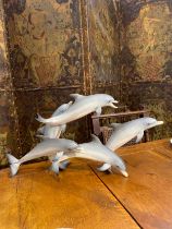 A figural group of dolphins by Hutschenreuther, limited edition 87/100, 33cm x 67cm