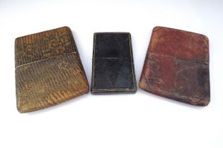 Five various card/cigar cases including leather and tooled examples and a beaded spectacle case