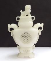 A Chinese Jadiete vase, pierced twin handle ring and dragons head detail with lid, 28cm