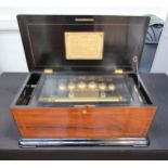 A Nicole Freres cylinder music box playing 12 airs with bells, with a 56 tooth comb and 6 tooth (