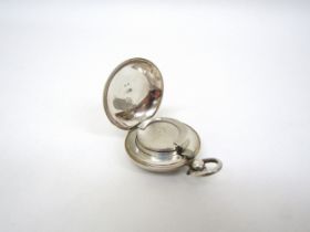 An E.J Trevitt & Sons silver circular sovereign case with engine turned detail, Chester 1910, 3.