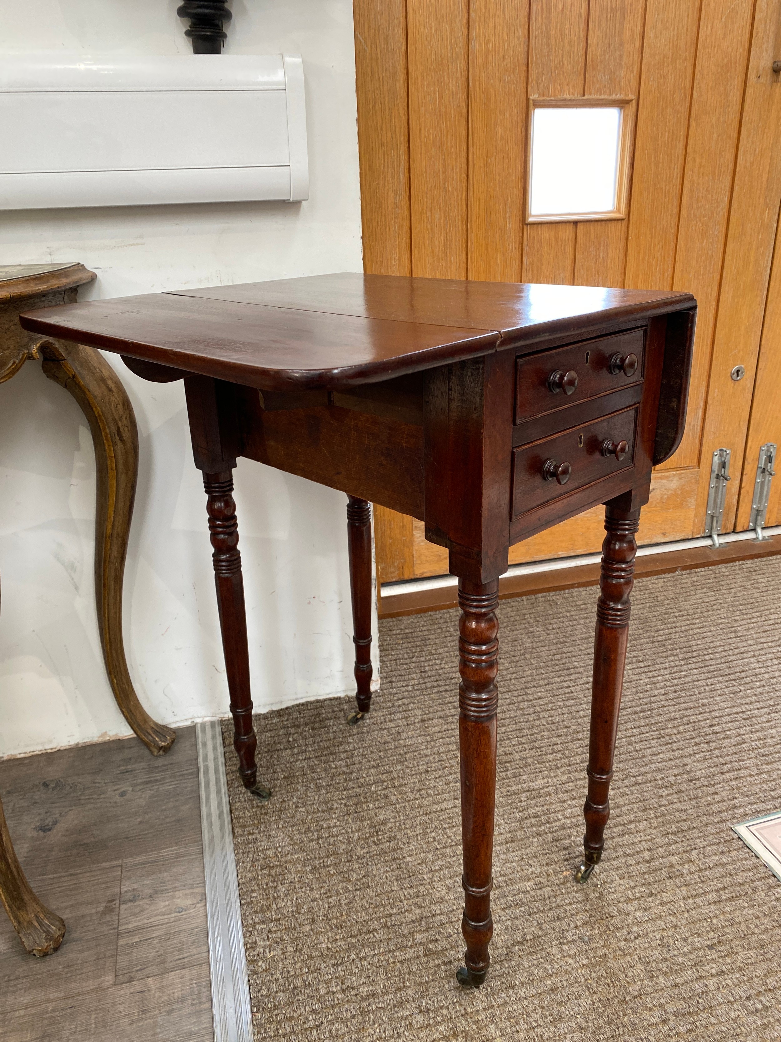 A Victorian mahogany two drawer drop-leaf work table, on turned supports to castors, 74cm x 31.5cm x - Image 2 of 3