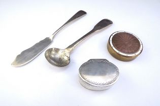 A silver salt spoon, silver butter knife, oval hinged patch pot, unmarked and a circular brass