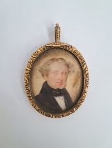 An early to mid 19th Century watercolour miniature on an oval ivory panel depicting the portrait