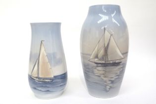 Two Bing & Grondahl Denmark maritime scene vases, 21cm tall and 25cm tall