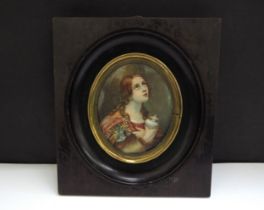 A Mid 19th Century miniature watercolour on ivory oval panel, after Carlo Dolci Maria Magdalina, set