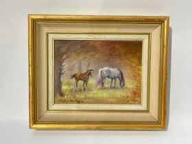 STEPHEN WALKER (1900-2004): Mare and foal in woodlands, oil on canvas, 14cm x 19cm