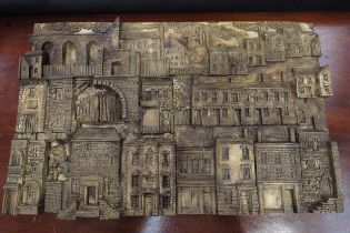 A Bernard Pearson plaque of rows of houses, dated 1983, 30.5cm x 48cm