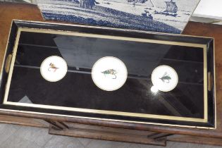A drinks tray set with fishing hooks, 64c x 28cm