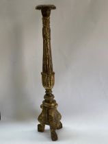 WITHDRAWN - A 19th Century French gilt wood candle stand, fluted column form, tripod base, 84cm tall